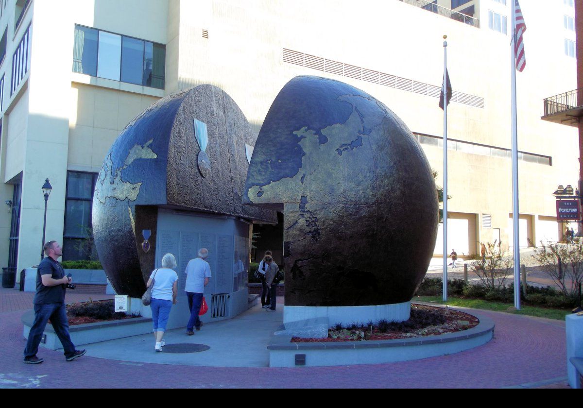 The Cracked Earth monument; a tribute to those who died in WWII. The names of soldiers who died are inscribed on the globe and the sidewalk.