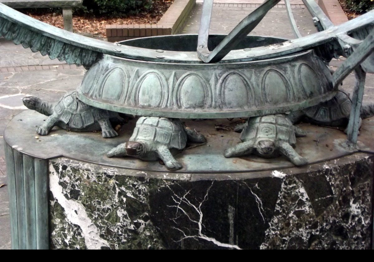 The large armillary sphere in the center of the square dates back to 1870. The sphere is supported by six turtles.