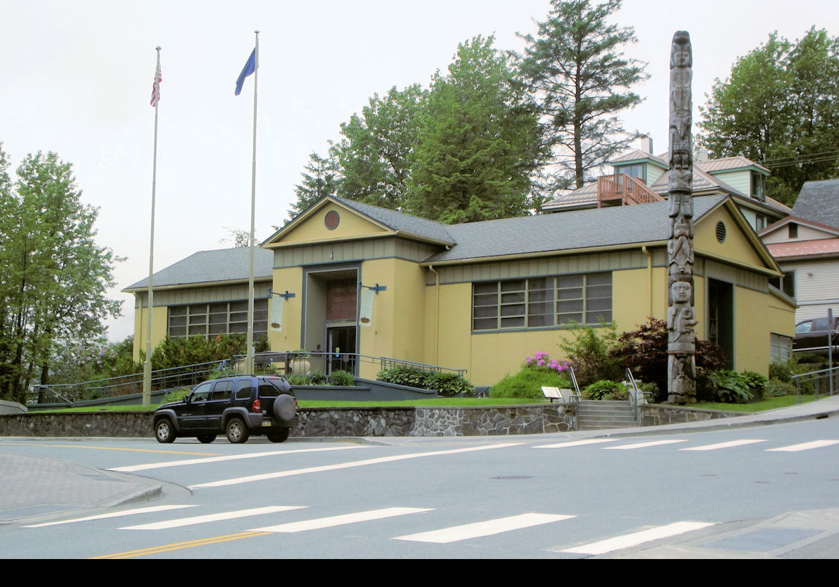 The Juneau-Douglas City Museum on the corner of 4th and Main streets.  The 1951 building was, originally, the Juneau Memorial Library.   It became the museum in the 1980s.  The museum includes items relating to gold mining, hydropower, skiing, outdoor recreation, fishing, politics and city history.