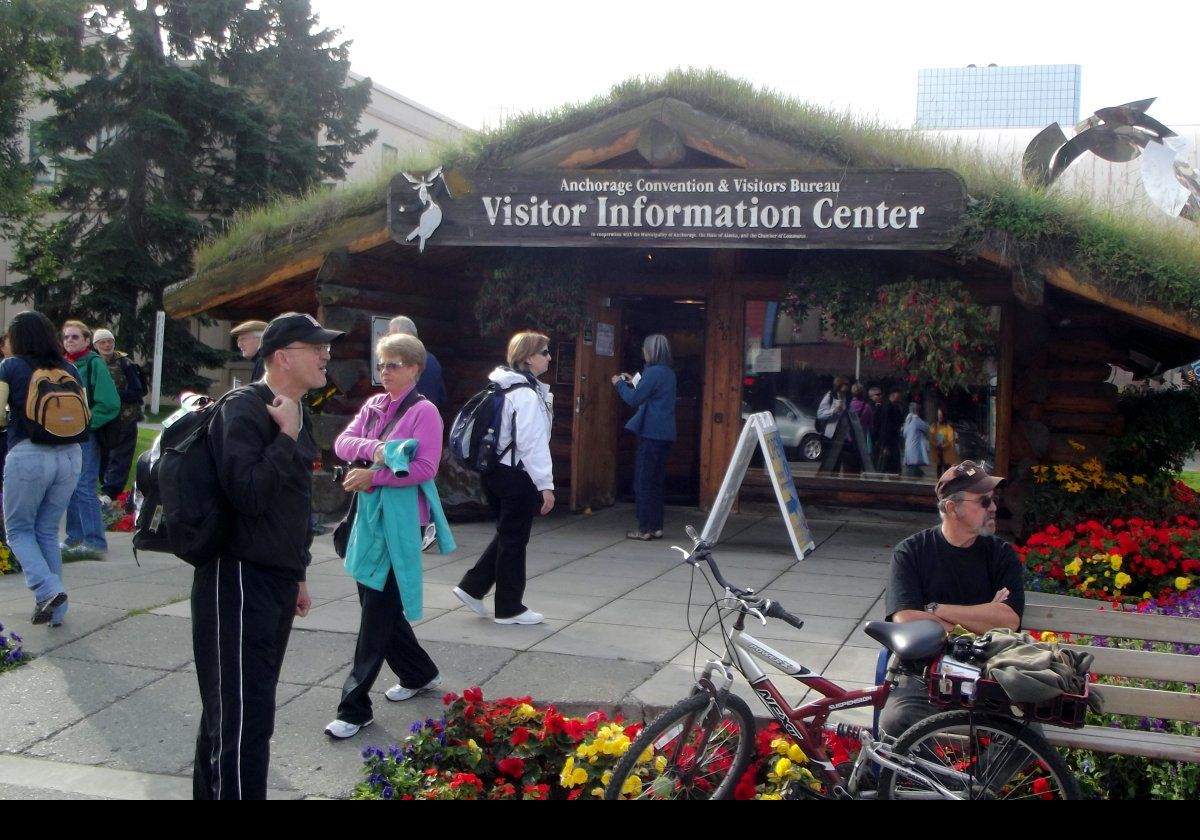 The visitors center featuring a grass roof. Again; a wonderful flower display. There are more flower pictures in the Anchorage Flora section.