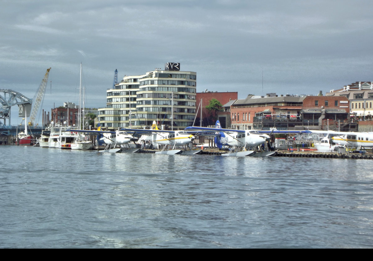 Float planes moored in the harbor.  The wonderful Victoria Regent Hotel, where we spent 5 excellent days, in the background and the Johnson Street "Blue" Bridge just visible on the extreme left.