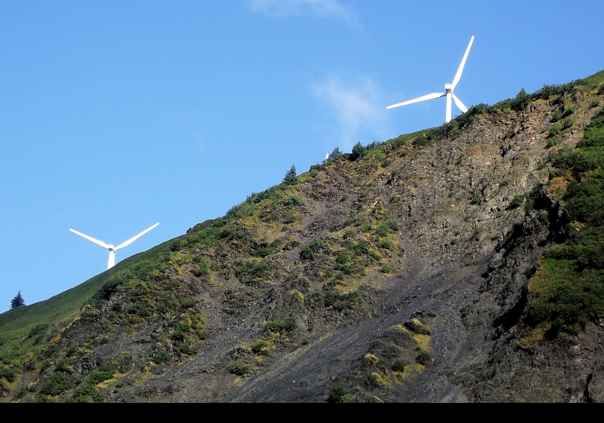 Two of the wind turbines in the Pillar Mountain Wind Farm in Kodiak, AK.  To date, this faciity has saved more than 6.5 million gallons of diesel fuel.  