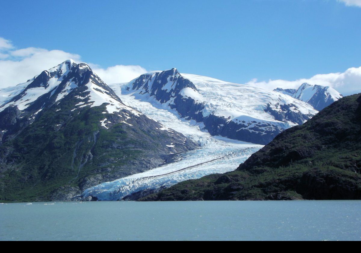 Our destination!  First sighting of the Portage Glacier.  Currently about 10km (6 miles) long, the glacier is retreating.  Click on the image to see a picture from 1958, taken by the U.S. National Oceanic & Atmospheric Administration, showing how much it has retreated.  . 