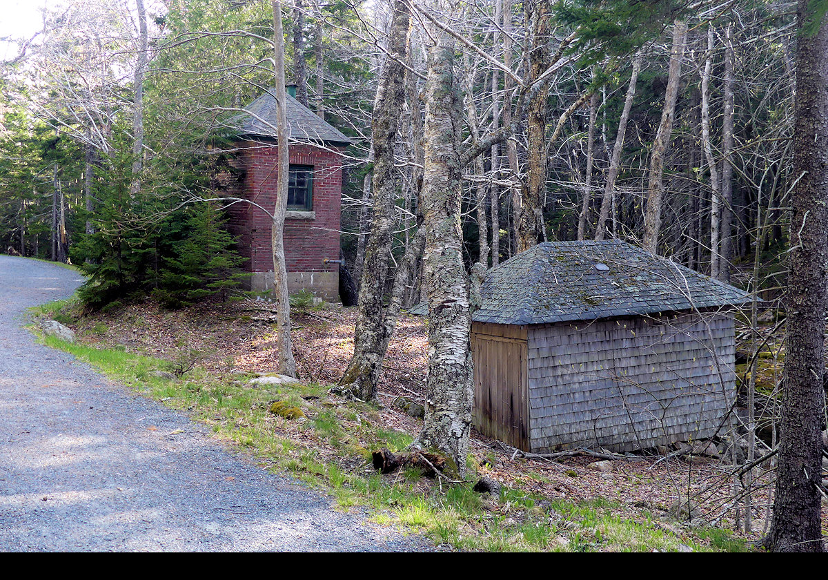 The taller of the two buildings is a small pump house we came across on the trail.