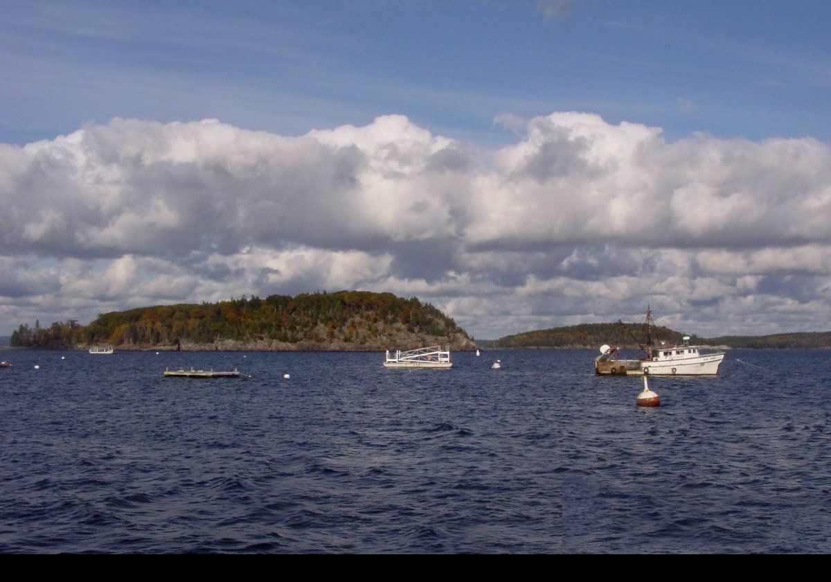 From the shore path, it is possible to see several islands just off the mainland.