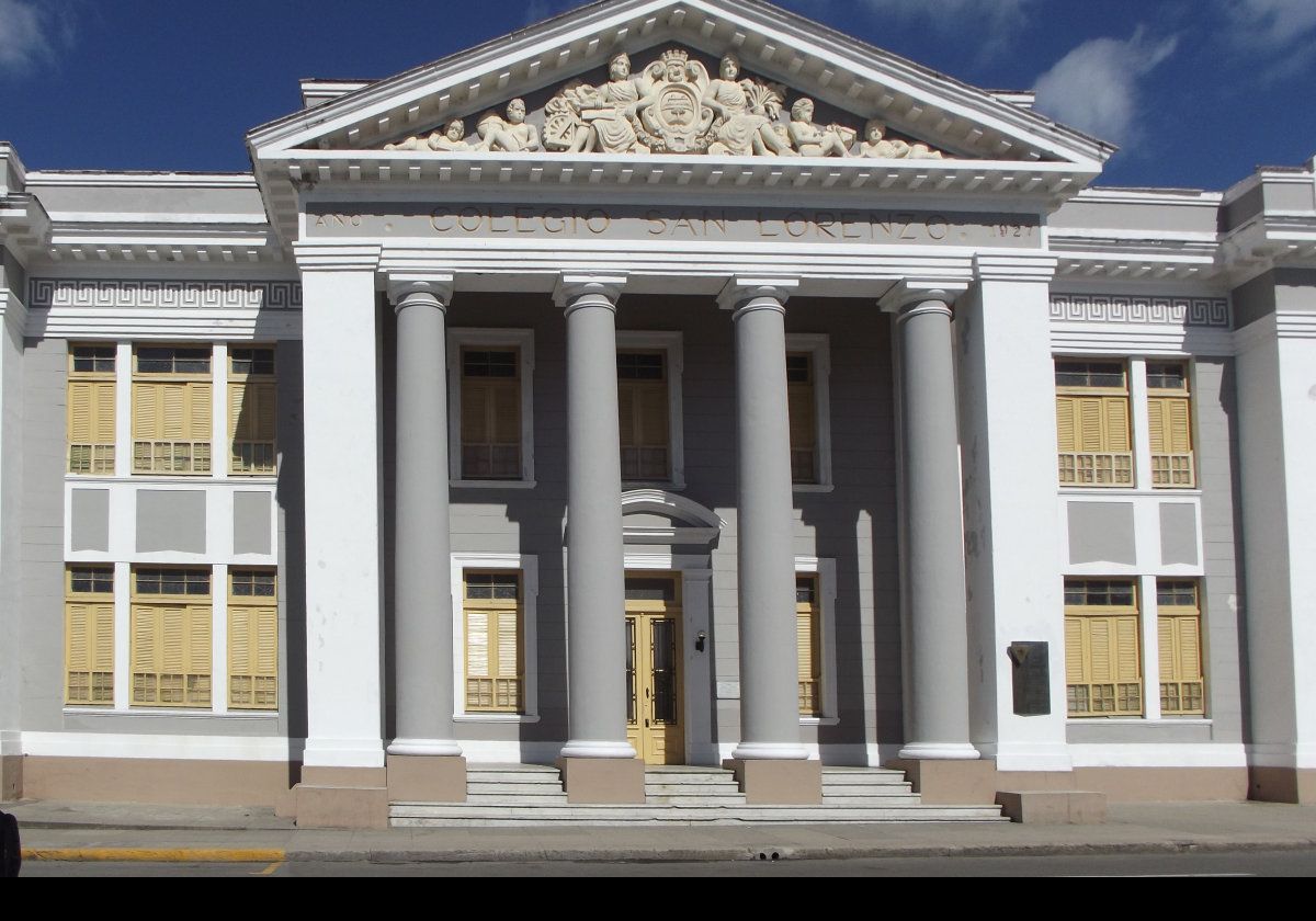 Colegio San Lorenzo.  On the east side of Teatro Café Tomás, this building with its striking colonnaded facade was constructed during the 1920s with funds left by wealthy city patron Nicolás Salvador Acea, whose name also graces one of the city's cemeteries.