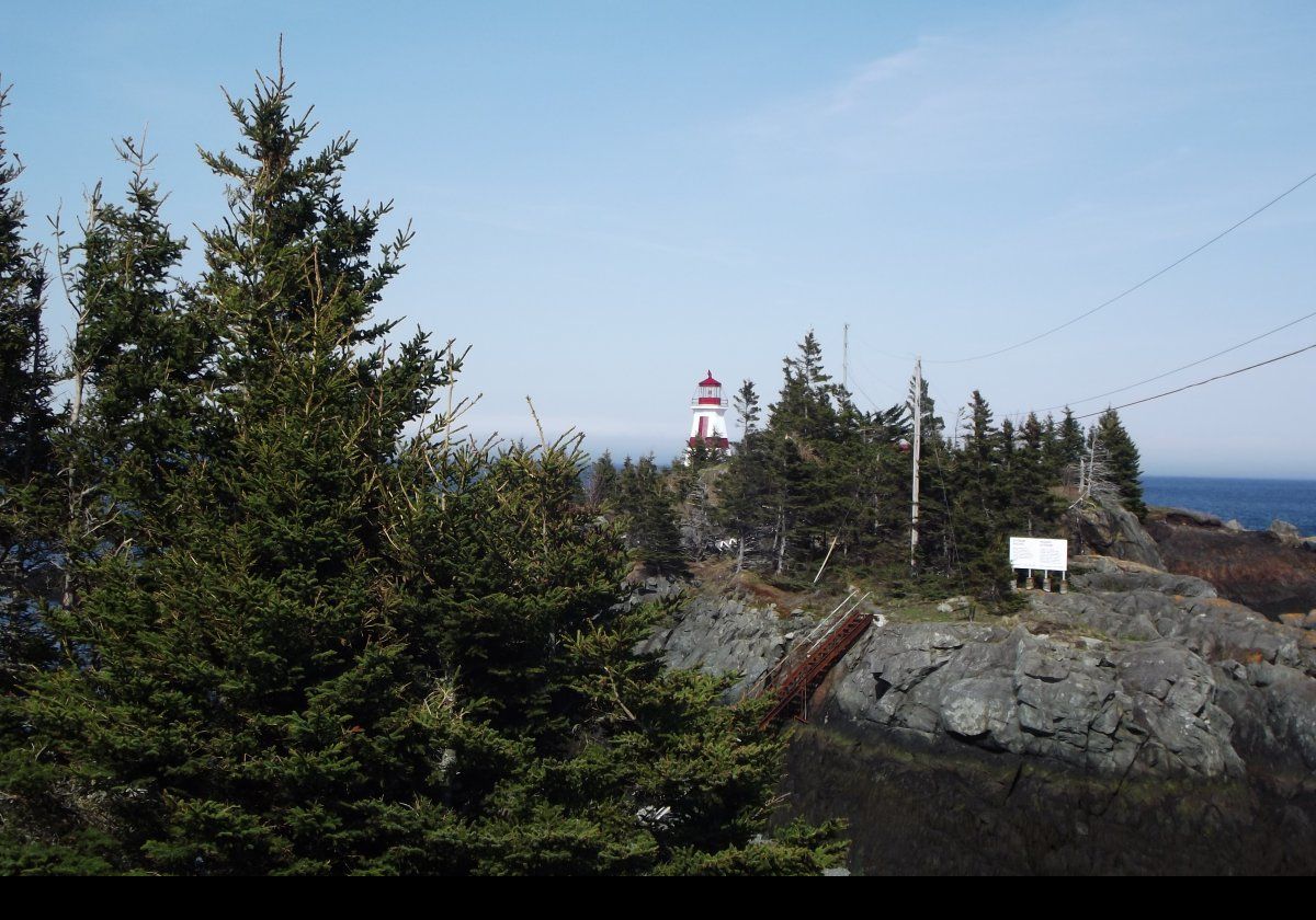 Built in 1829, Head Harbour Lighthouse (or East Quoddy to Americans to differentiate it from the beloved West Quoddy light) sits on a small rocky outcropping just off the northern tip of Campobello Island in Canada. The tower is 51 feet (just over 15.5 meters) tall with a red cross and a red lantern room.