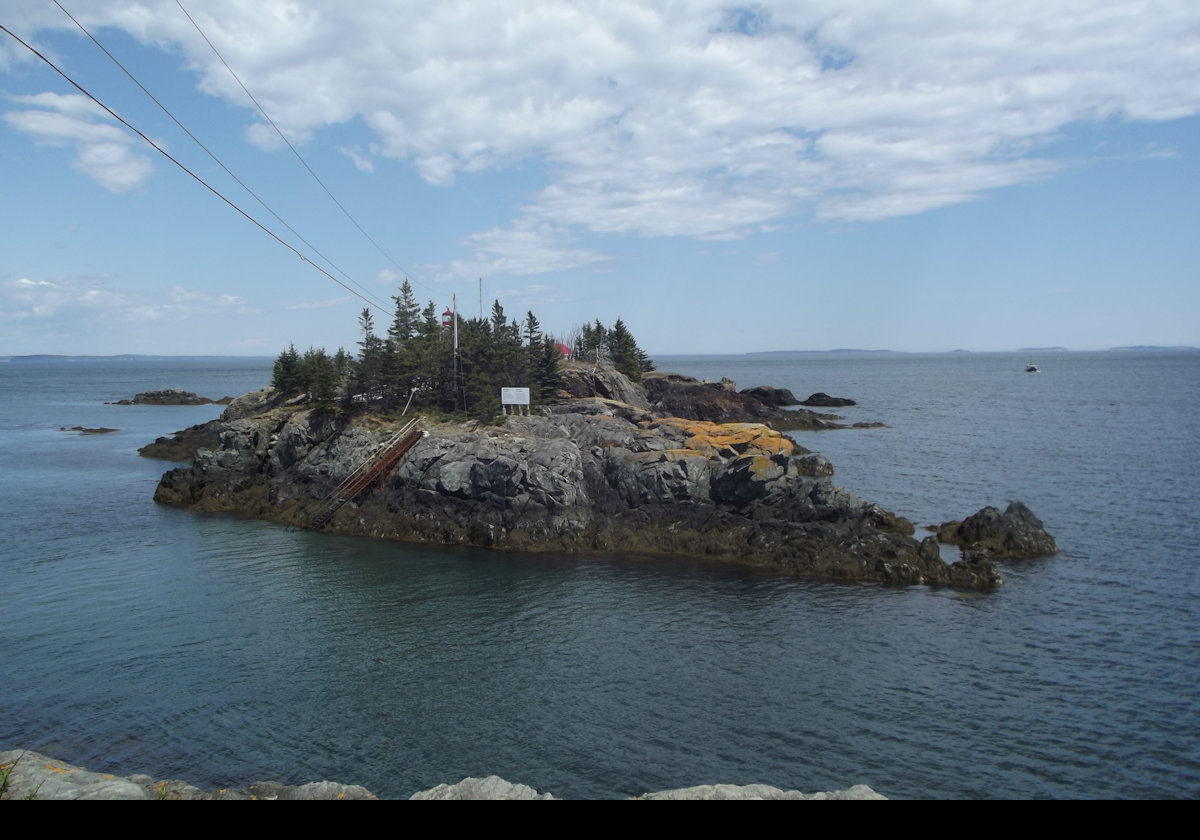 The large red cross was added to the lighthouse in 1842, as a day marker, when a larger lantern room was installed to accomodate the 8 lamps with 22 inch reflectors.