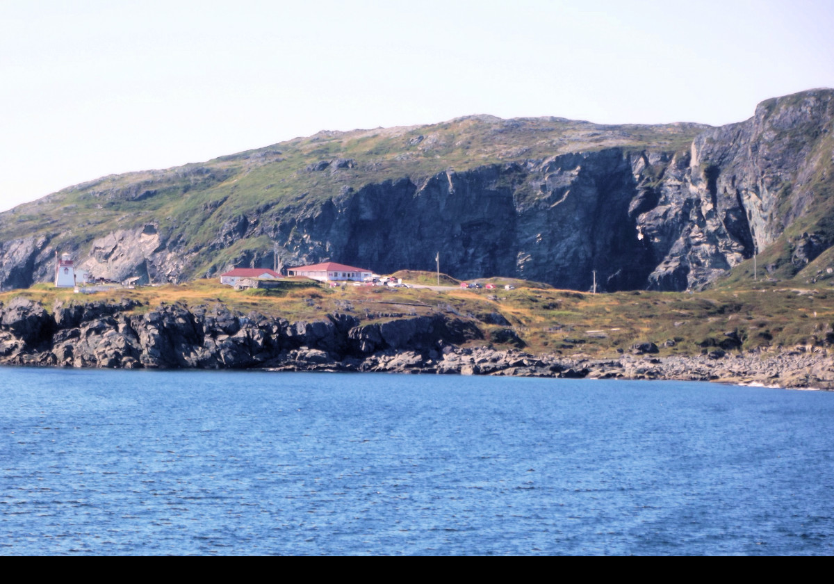 Constructed in 1912, the original lighthouse was a cylindrical iron tower with a balcony & acetylene gas lantern. A single-story building with a square tower replaced the iron tower in 1960, and was fitted with an electric light.