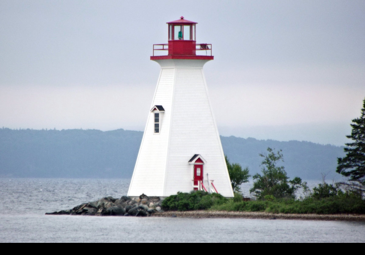 The curent lighthouse was built in 1912. The two both remained standing for several years until the old light was removed.