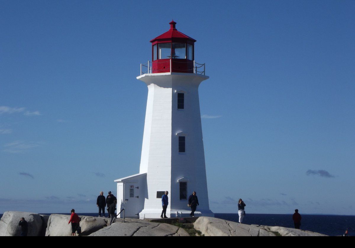 When the new lighthouse was completed, the old house became the keepers cottage. The new lighthouse showed a white light rather than the red light of the old lighthouse. The lantern housing was also painted white.