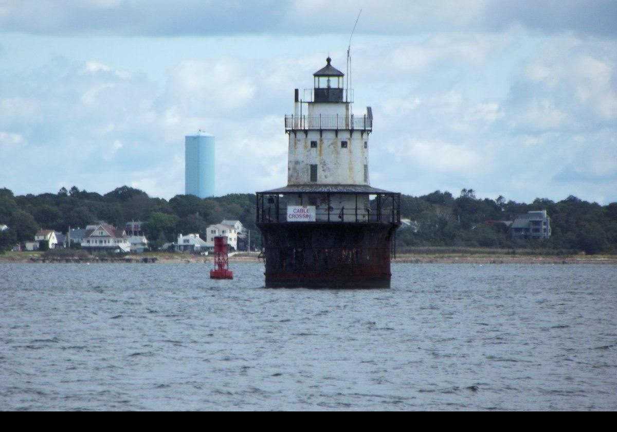 The lighthouse is located on the mouth of the Acushnet River in the New Bedford outer harbor.