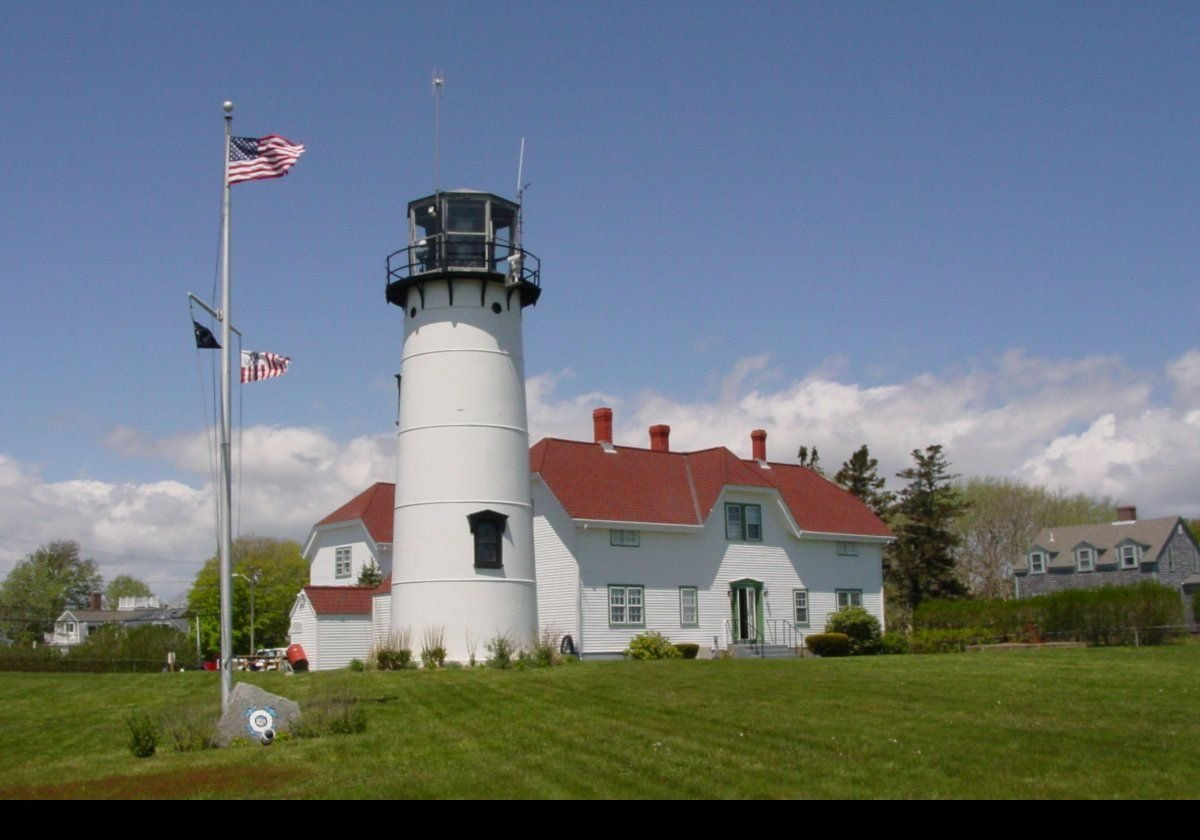 The lighthouse was first built in 1808, comprising a pair of octagonal wooden towers approximately 12 meters (40 feet) high.  This served a dual purpose; to distinguish the light from the Highland, and to act as "range lights" to mark the safe channel.  
