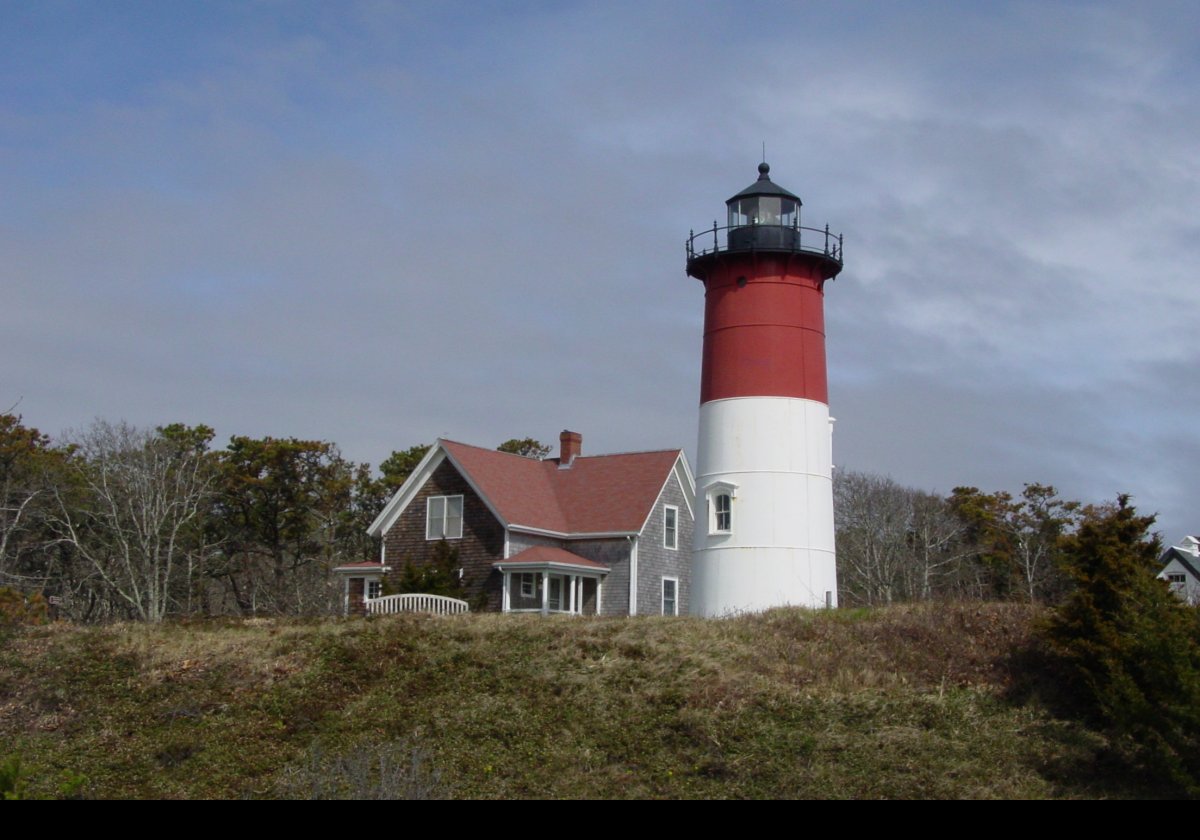 The lighthouse was moved to Eastham in 1923 to replace the "Three Sisters of Nauset".  These are preserved on a nearby clearing, and there are pictures in this slideshow.