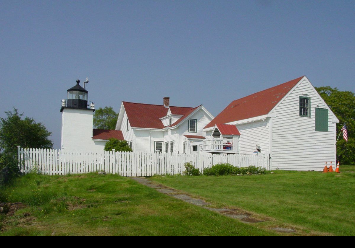 In 1890, a bell tower and a barn were added, and an oil house was built in 1897.  All of the buildings are still standing.  A brighter incandescent oil vapor lamp was installed in 1935, and the light was electrified in 1950.    The lighthouse was automated in 1988.  