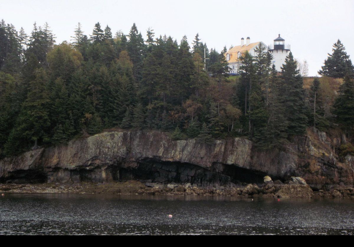 An offshore buoy, with light and bell, replaced the lighthouse in the early 1980s.