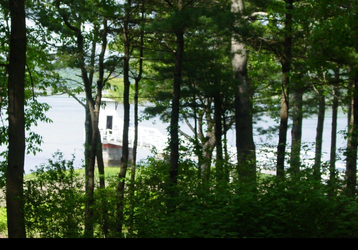 Our first glimpse of the lighthouse through the trees.