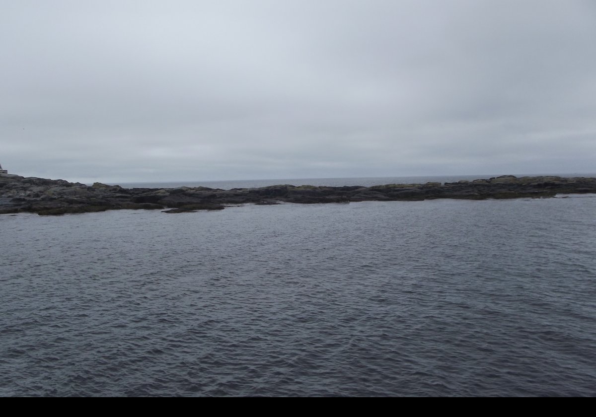 Egg Rock is a small island foughly midway between Mount Desert Island to the west, and Turtle Island (off the coast of the Schoodic Peninsular) to the east. It is long and thin, about 500 mt or 547 yards on its longest axis.