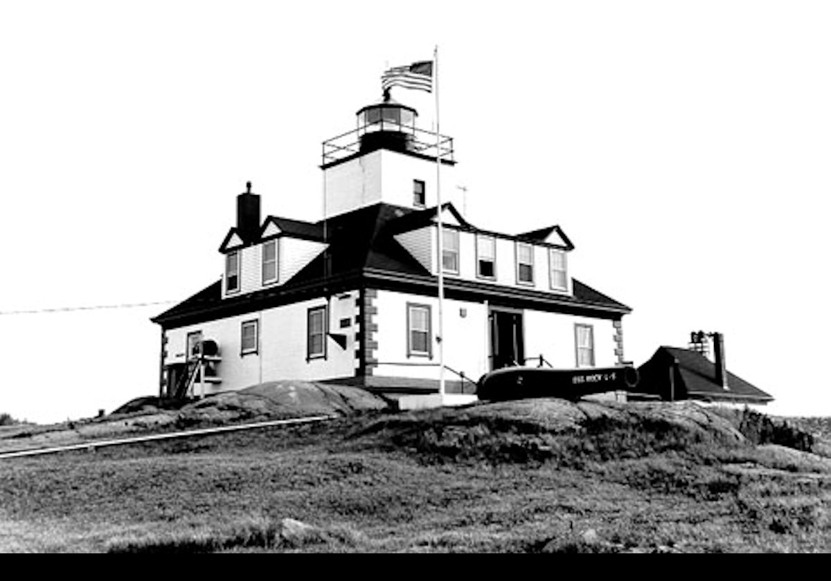 An older picture of the Lighthouse taken after the 1899 2nd-story addition had been built. The Photograph is from the U.S. Coast Guard.  Compare to the previous photograph.