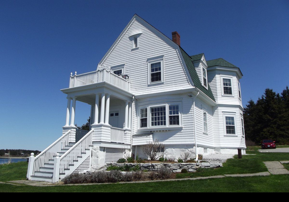 A Colonial Revival style keeper's house was built in 1895 to replace an earlier one that was destroyed by lightning.  An oil house and a bell tower were added in 1898.  The bell was replaced with a fog horn in 1969.