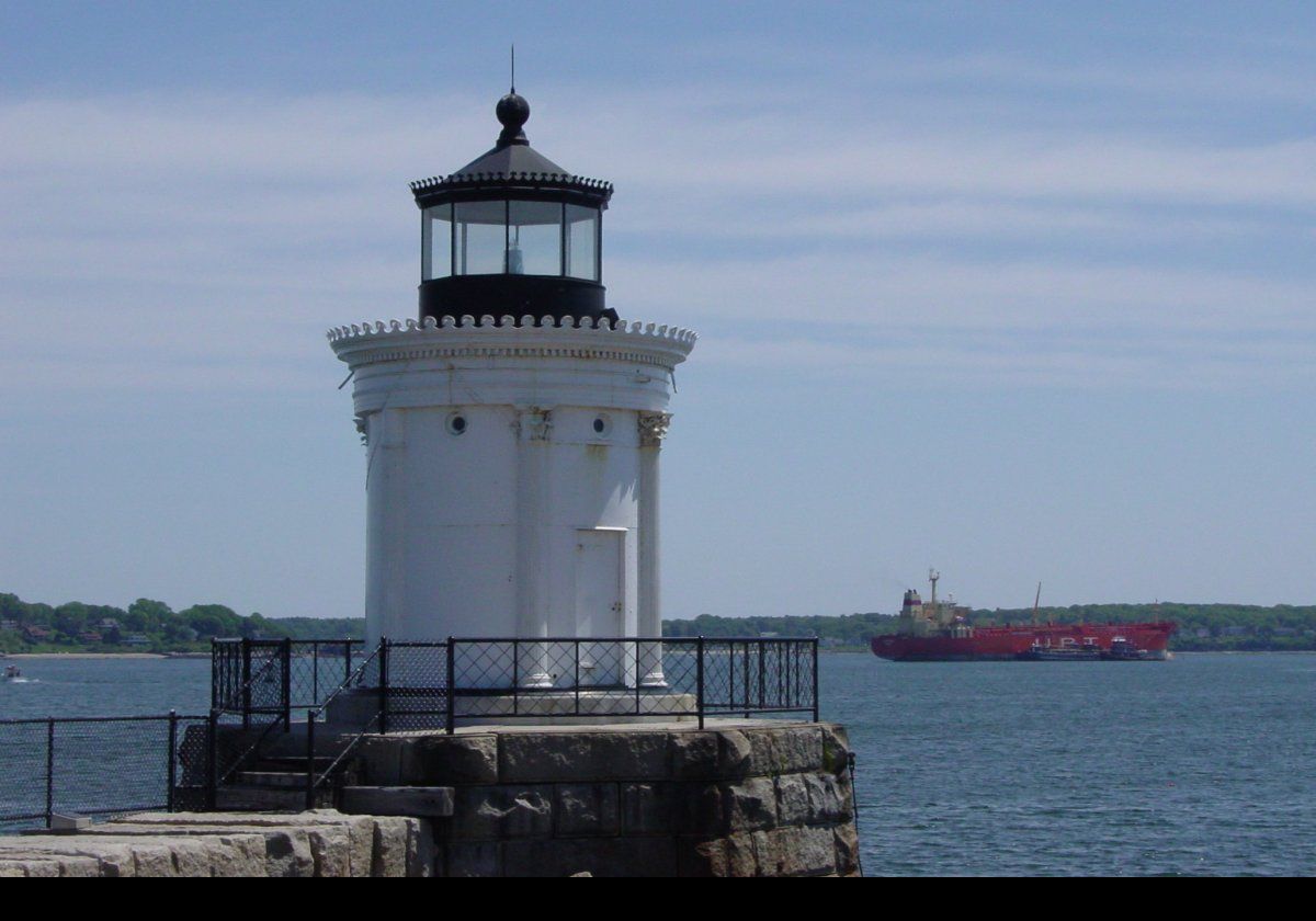 The Portland Breakwater Light. By 1889, a small keepers house was built adjacent to the lighthouse, and in 1903 a second story was added. In 1934 the light was electrified, and the following year the keepers cottage was demolished. During the 1940s, the local shipyards expanded their operations into the harbor reducing the length of the breakwater until, as now, it was only about 100 feet off shore. It was decommissioned in 1943.