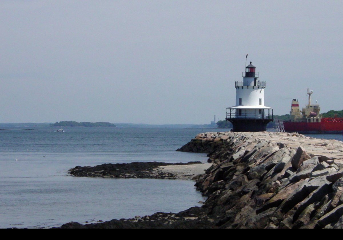 The Spring Point Ledge Lighthouse. In 1951, the breakwater that is visible in the photographs was built. The lighthouse is open to the public on a few days a year.