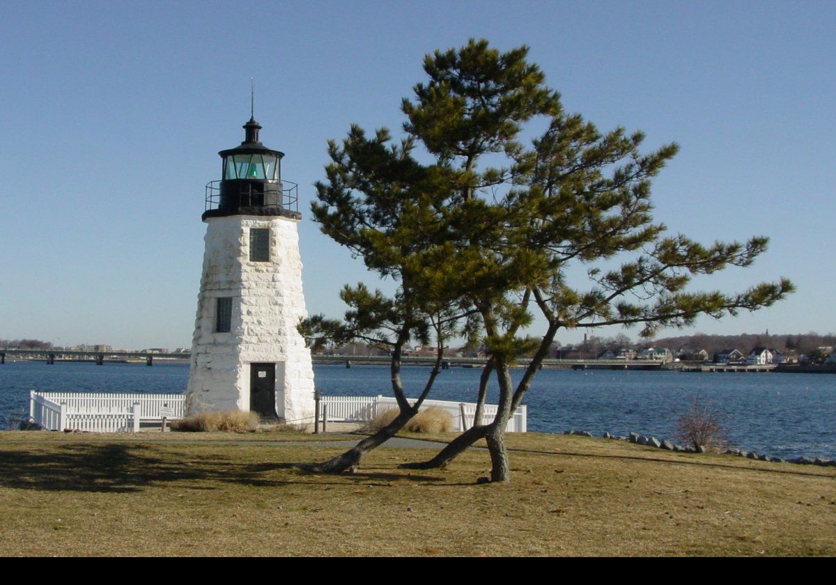 On January 1st 1824, the first lighthouse on Goat Island was lit in a 20 foot tall stone tower, with a keepers cottage nearby.  A new, twenty-nine foot tall stone lined granite tower was erected on the end of a purpose built dike and went into service in 1842.  