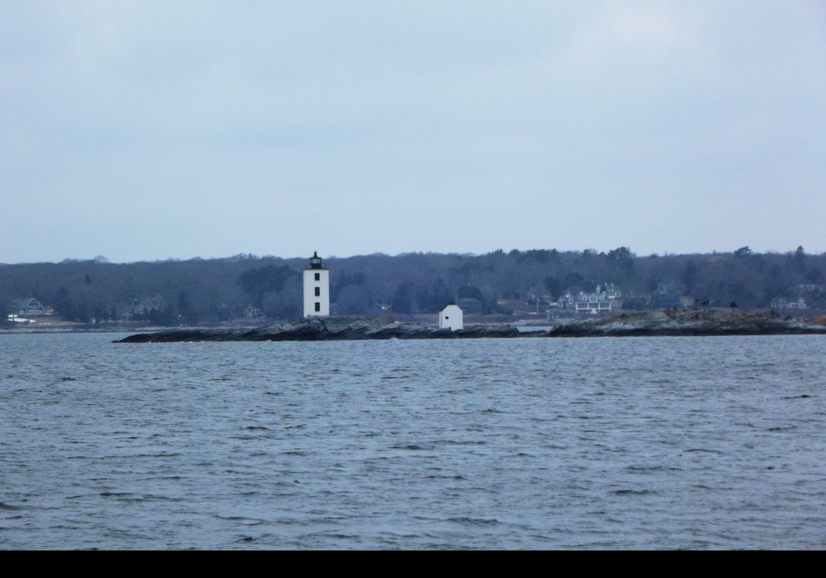 The lighthouse sits on Dutch Island in Narragansett Bay off the coast of Conanicut Island, near to Jamestown in Rhode Island.  There is also a keeper's house.