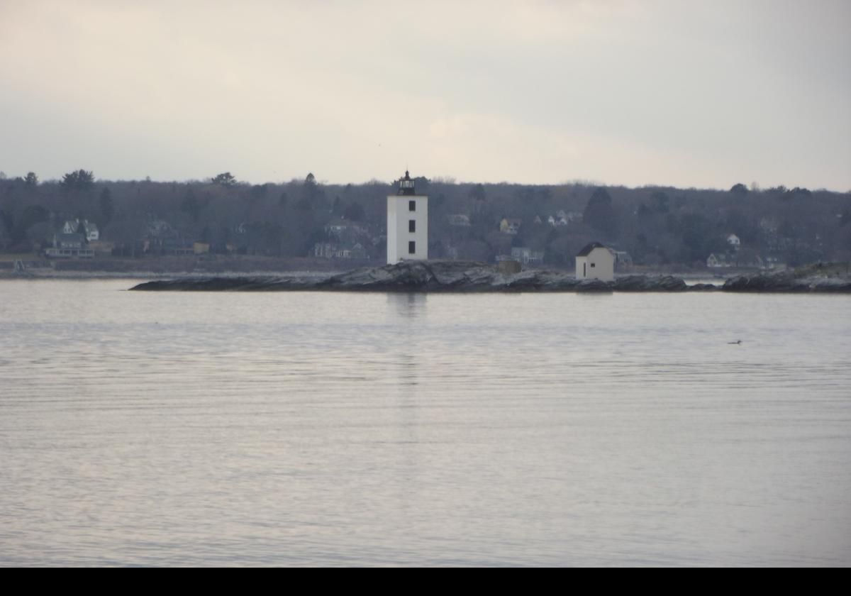 The light was a fourth order Fresnel lens.  By 1924, the light was replaced by a flashing red light rotated using a weight and pulley system. In 1943, the Coast Guard replaced the kerosene lamp with an electric light, and automated the lighthouse.