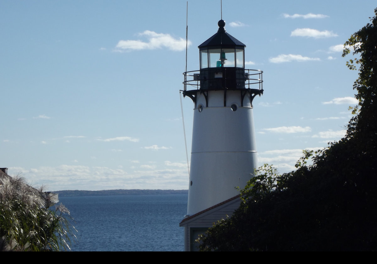 The lighthouse we find here was built in 1932. It was a similar height, but further inland. An electric light was placed in the Fresnel lens, and a new electric fog signal was installed.