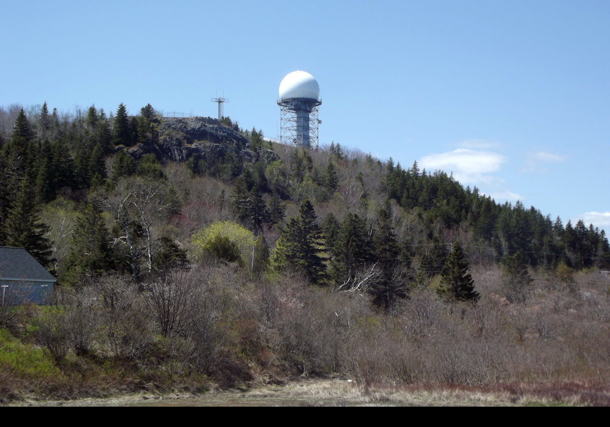 Built in 1955, this was the 907th Aircraft Control and Warning Squadron (AC&W Sq). It was deactivated on 30 June 1979. Today the site is part of the Joint Surveillance System. The surrounding area is now owned by the State of Maine, and is part of the Down East Corrections Department.