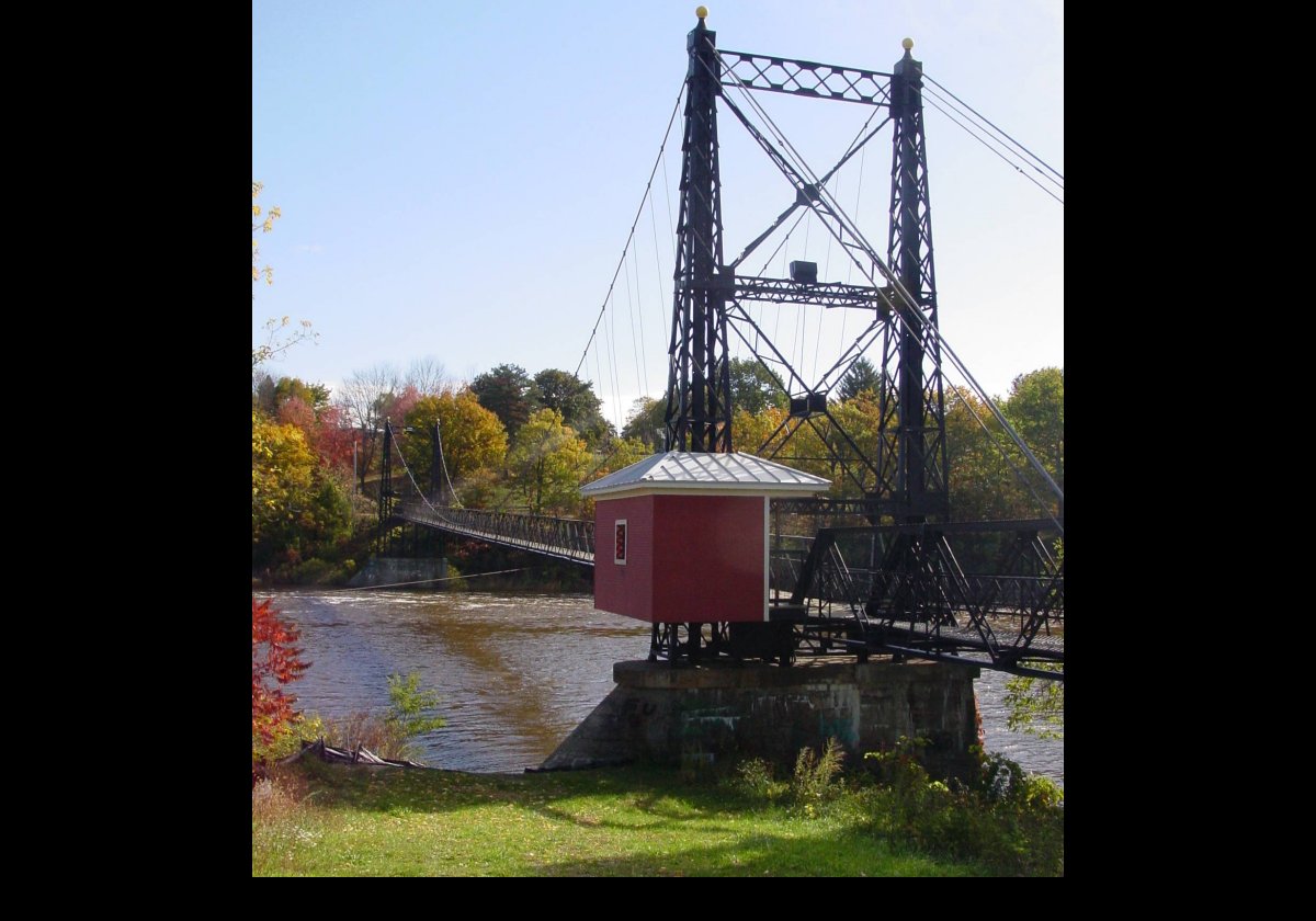 The toll was abandoned in 1960 when the owners gave the bridge to the city of Waterville. It was added to the National Register of Historic Places in 1973. Following structural damage in 1990, both the bridge and the toll booth were restored. It is not currently (October 2010) in use.