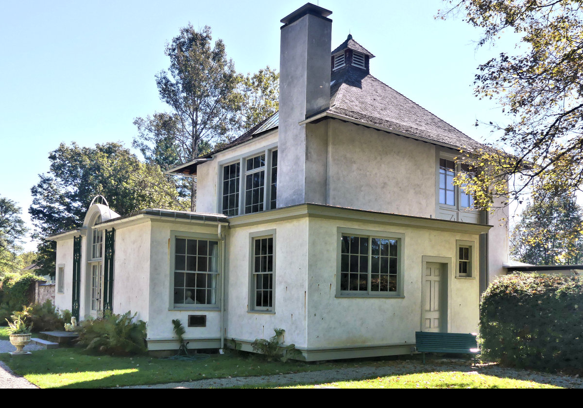 Following his purchase of the farm, French had a studio built on the property, to a design by his friend Henry Bacon, near the c. 1820 farmhouse. This space would become French's primary studio space for the rest of his working career, even though he divided his time between Stockbridge and New York City. In 1901 French hired Bacon to design a replacement for the farmhouse, the Georgian Revival structure now standing on the estate.