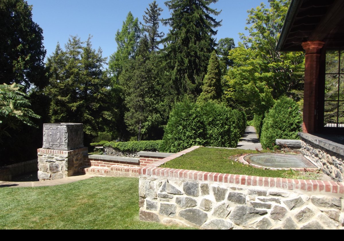 Part of the grounds close to the house. A corner of the porch, from which the tours start, is just visible on the right.