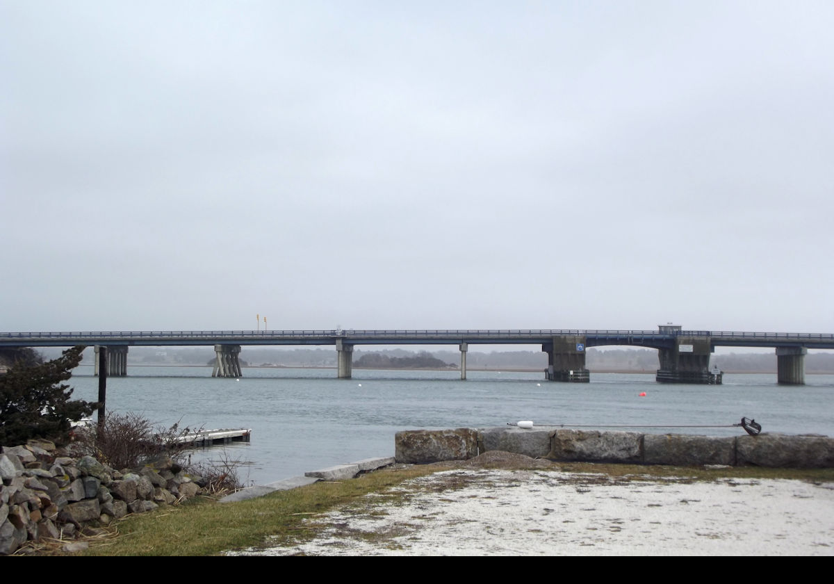 This is te Normand Edward Fontaine Drawbridge Bridge, or bascule bridge built in 1958.  It is 312 m (1,025 feet) long.  It carries Route 88 from Westport Point to the north to the Horseneck Beach State Reservation in the south.