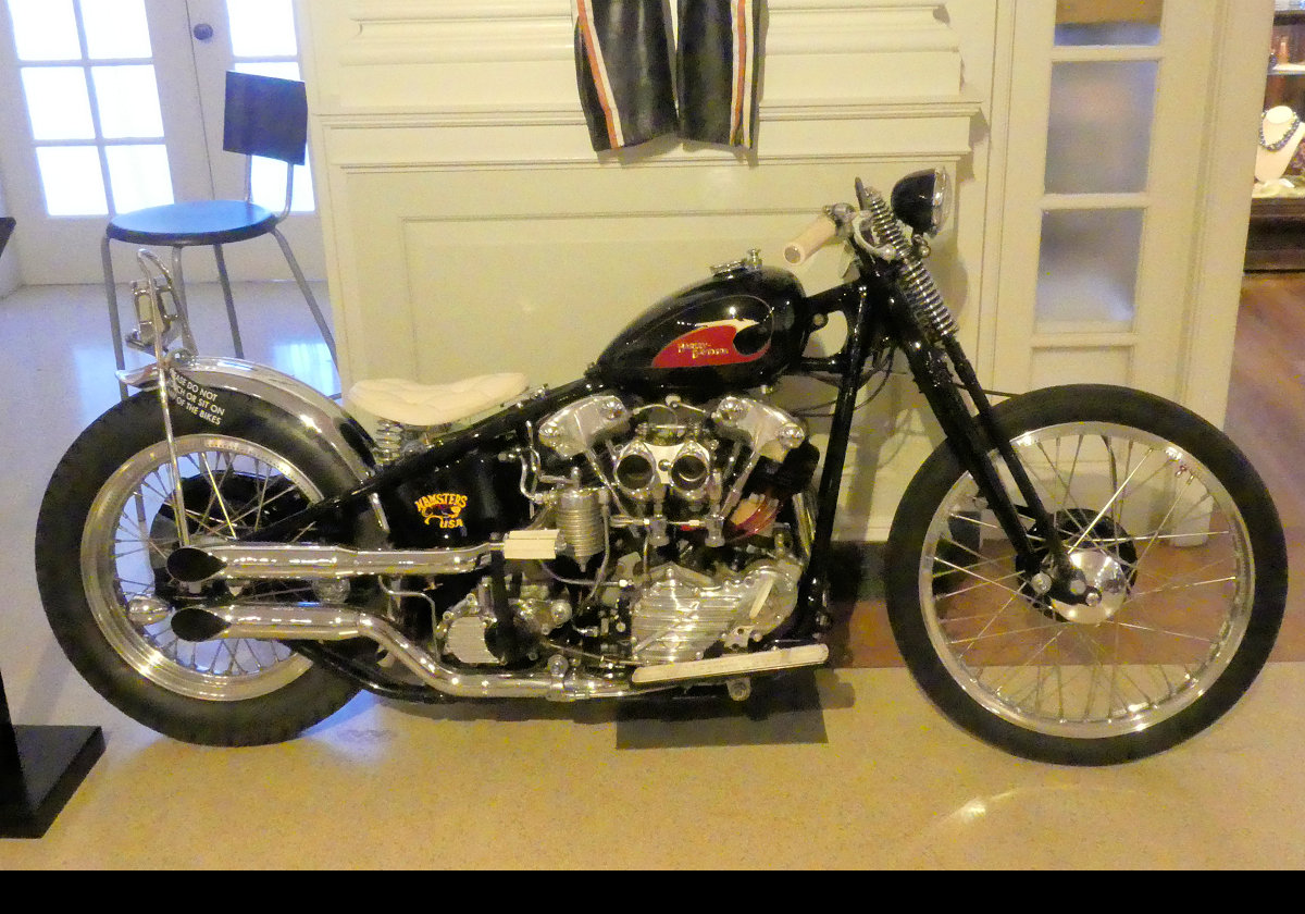 1942 knucklehead Bobber.  Knucklehead refers to the fact that the rocker-box ends resemble the knuckles of a fist.  A Bobber was originally known as a 'bob-job' from the 1930s up to the1990s.  Involves removing all unnecesary bodywork and parts to reduce weight; e.g. removing the front fender and shortening, or "bobbing", the rear fender.  
