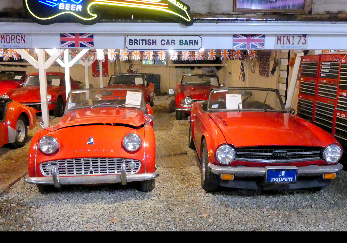 On the left, a Triumph TR3 produced between 1955 and 1962 by the Standard-Triumph Motor Company. On the right, a Triumph TR6 built between 1968–76.