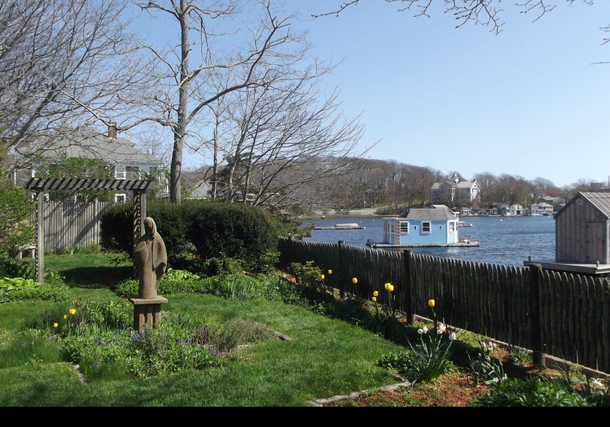 The tower and gardens are located on Millfield Street in Woods Hole right next to Eel Pond, on a small plot of land about 190 feet by 25 feet (58.5 mts x 7.7 mts).  Statue of "The Virgin" by M. S. Hannell in the Garden of Our Lady.