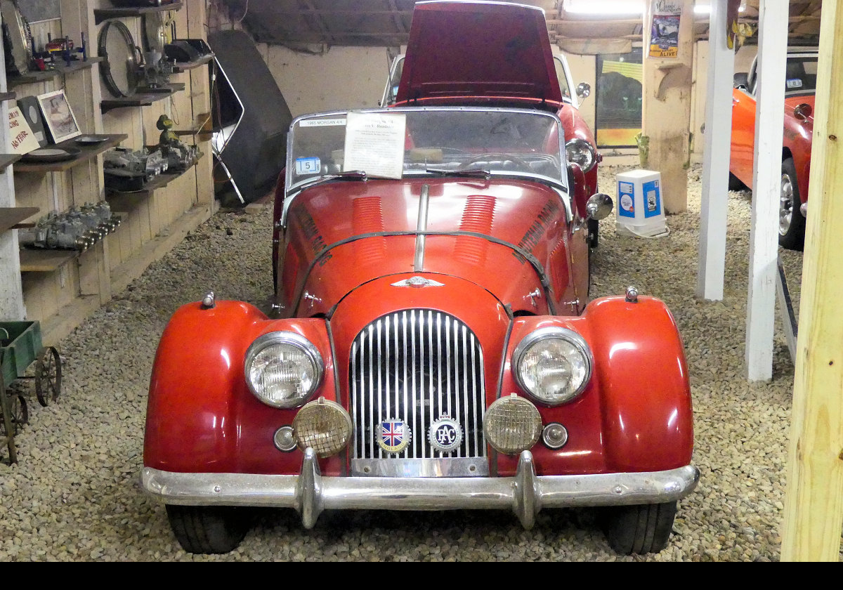 A 1965 Morgan 4/4.  It has been built by Morgan since 1936, and was Morgan's first four wheeled car.  Powered by a 65 bhp, 1498 cc Ford engine and four-speed transmission.  The 4/4 was discontinued in 2019.
