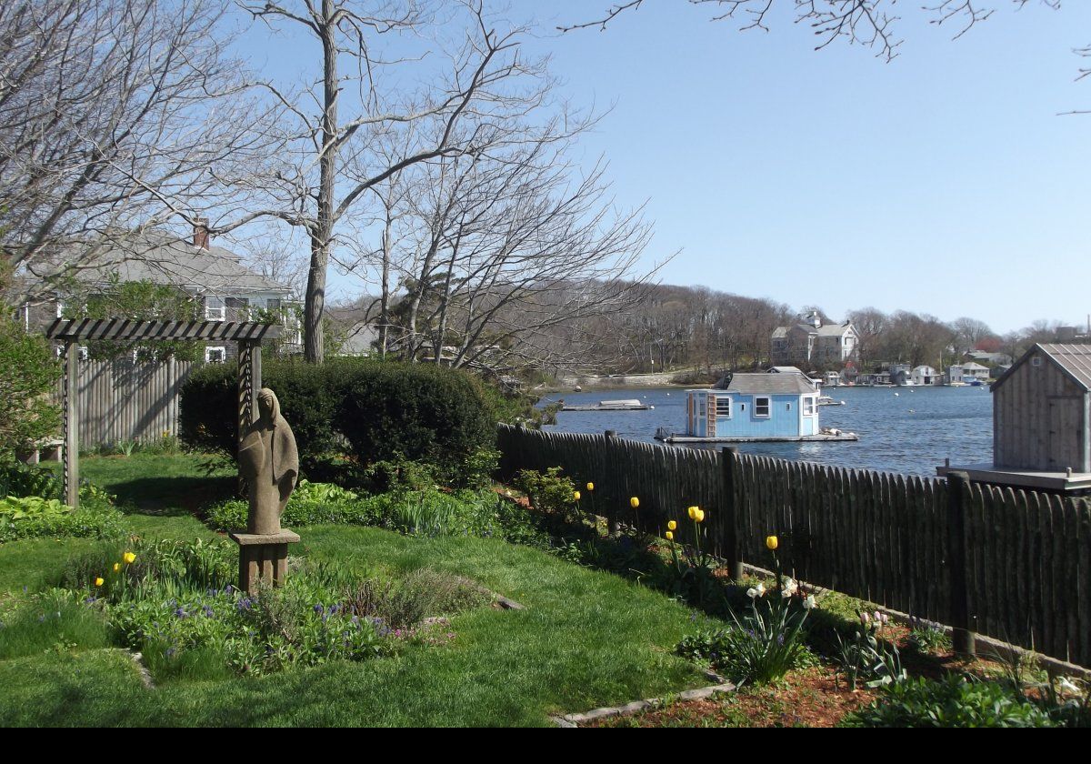 The tower and gardens are located on Millfield Street in Woods Hole right next to Eel Pond, on a small plot of land about 190 feet by 25 feet (58.5 mts x 7.7 mts).