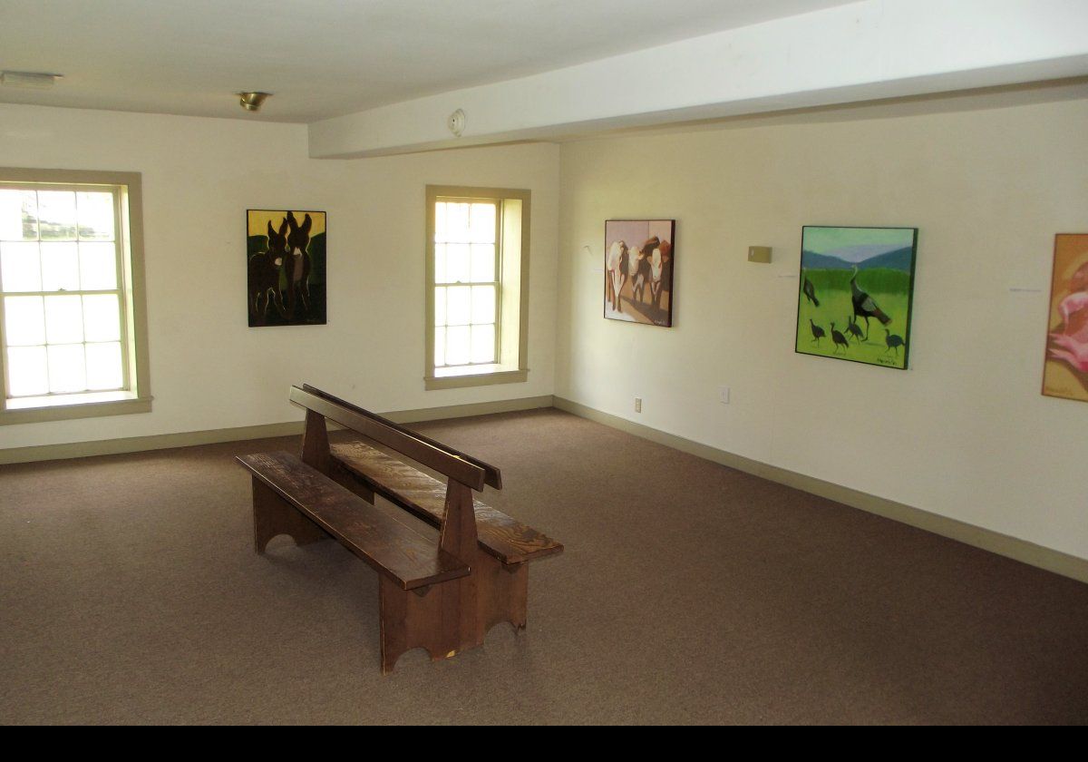 The lower floor of the Brick Poultry House serves as gallery space for local artists. 