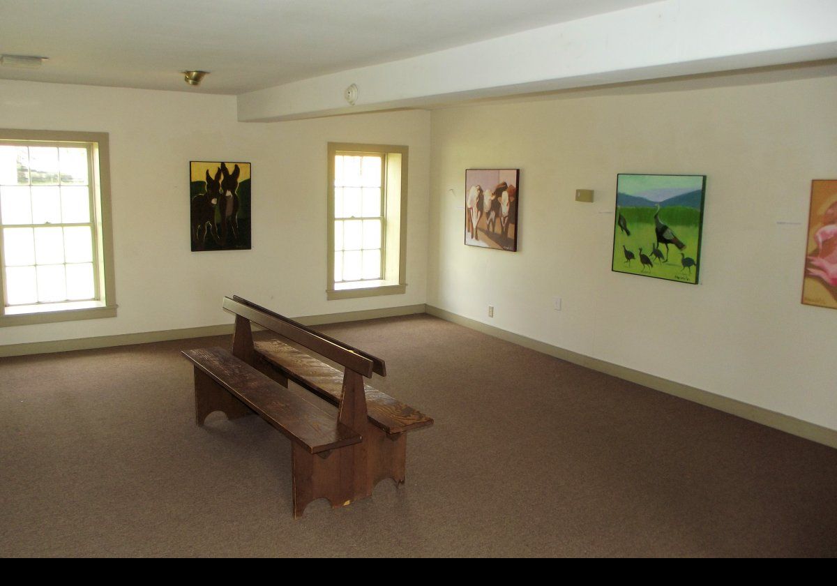 The lower floor of the Brick Poultry House serves as gallery space for local artists.