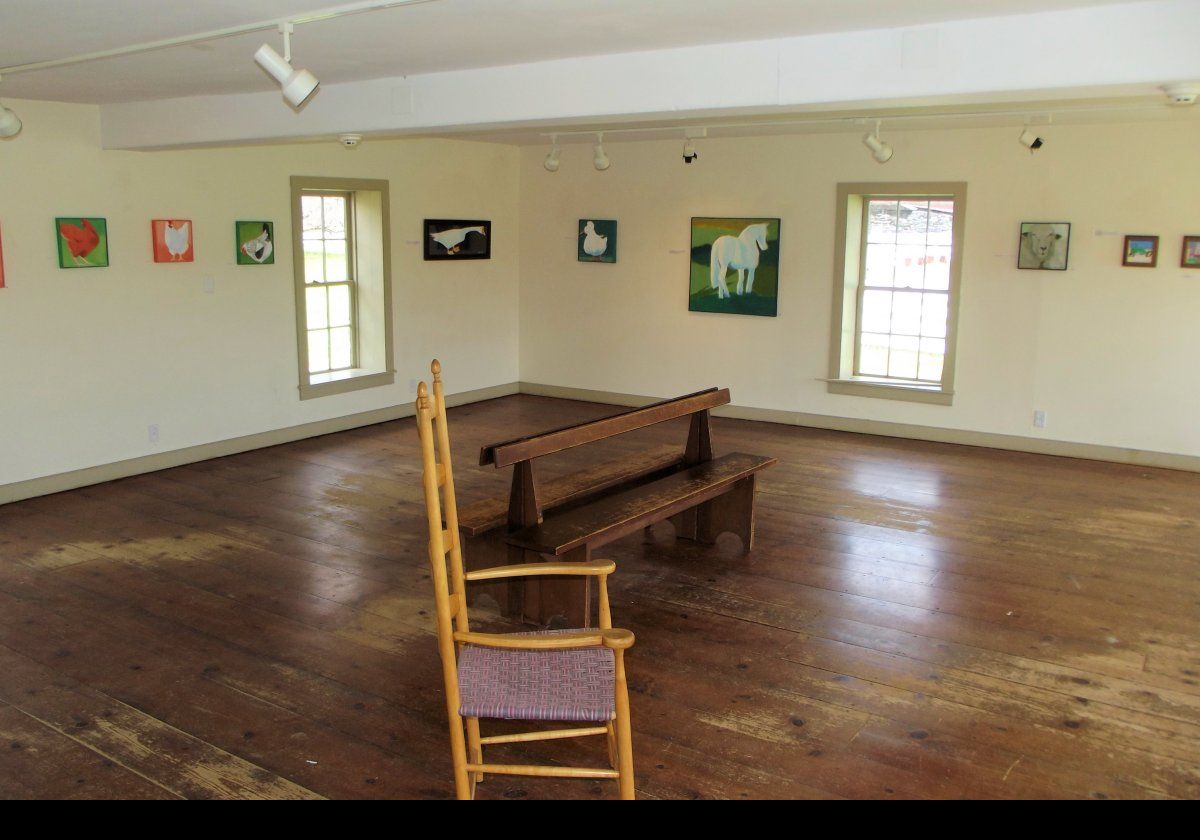 The lower floor of the Brick Poultry House serves as gallery space for local artists.