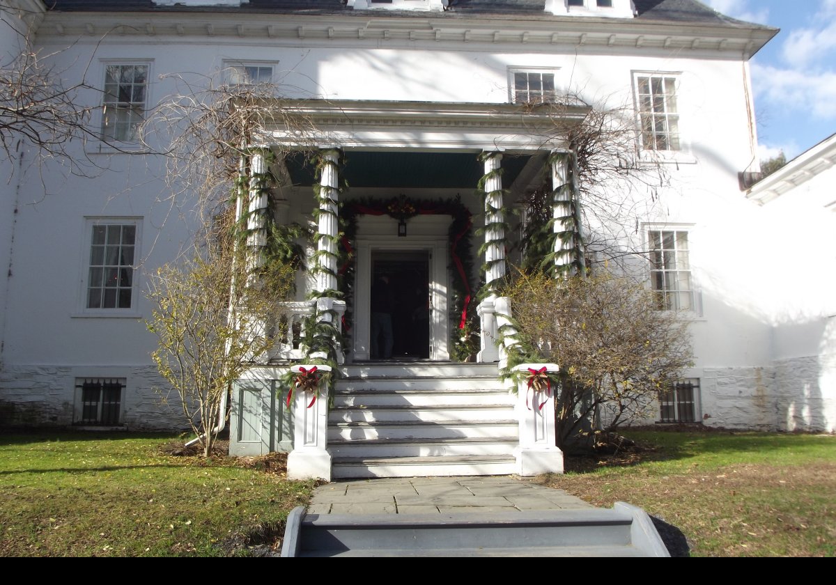 The front entrance to the house decorated for the Christmas holiday.