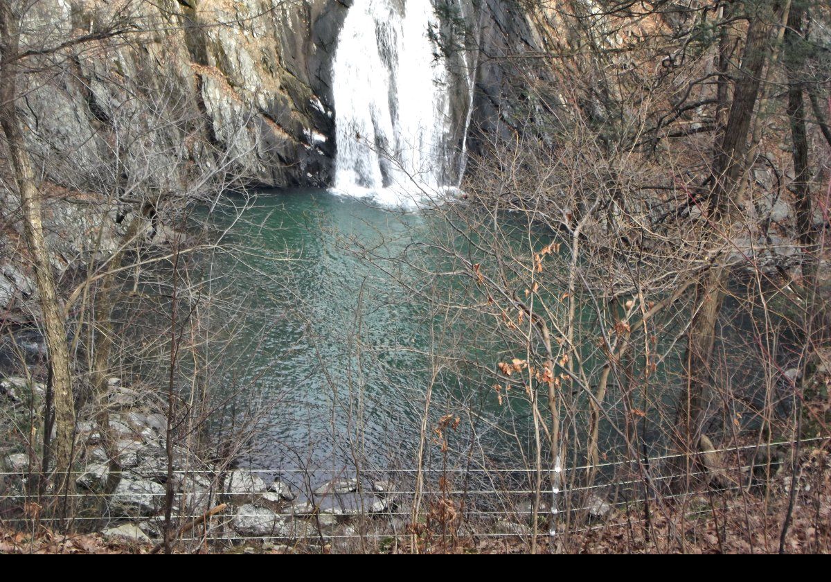 The pool seems so serene compared to the water falling into it.