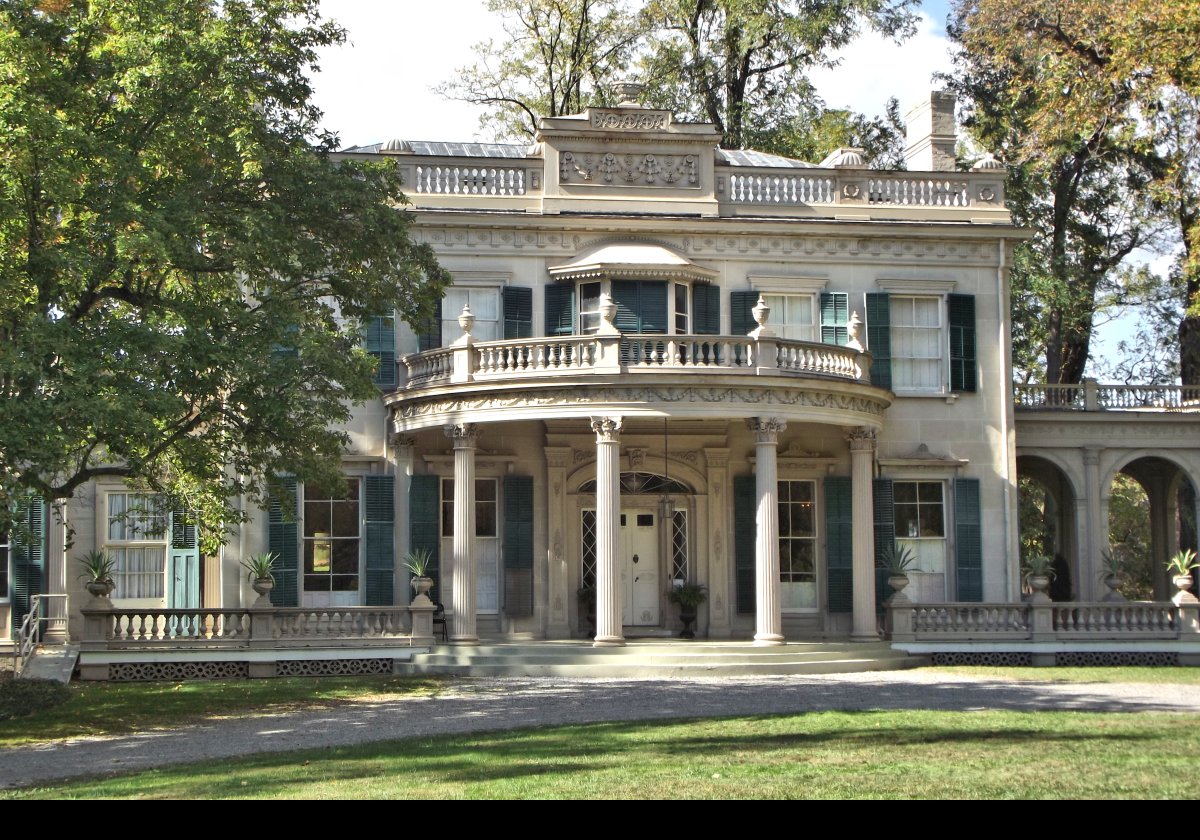 In the mid-1800s, the architect Alexander Jackson Davis added classical revival exteriors to the Federal style house. This is what we see today. It is remarkably well preserved.