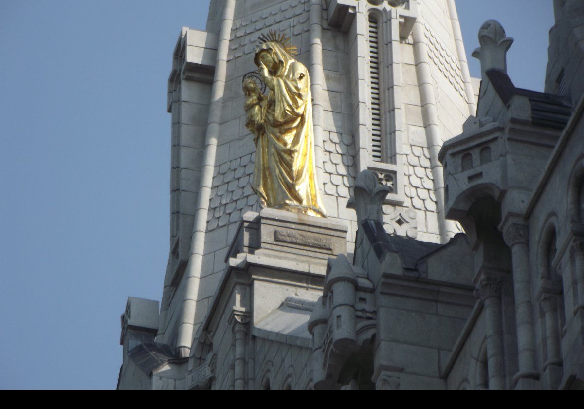 A Statue of Saint-Anne by Matthias Zens located above the main entrance.  It dates to 1880.