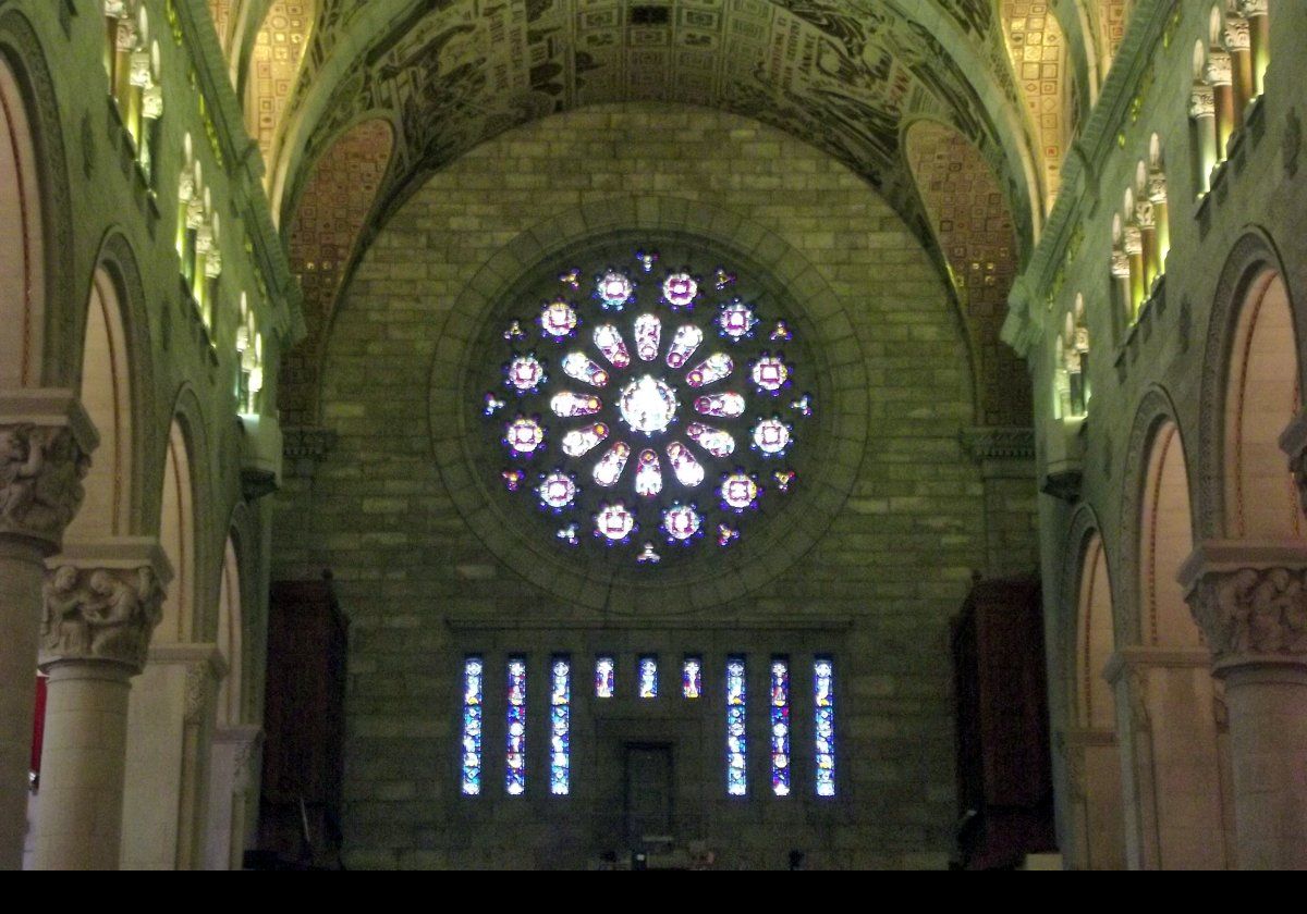 Interior of the Basilica of Sainte-Anne-de-Beaupré showing a number of stained glass windows.