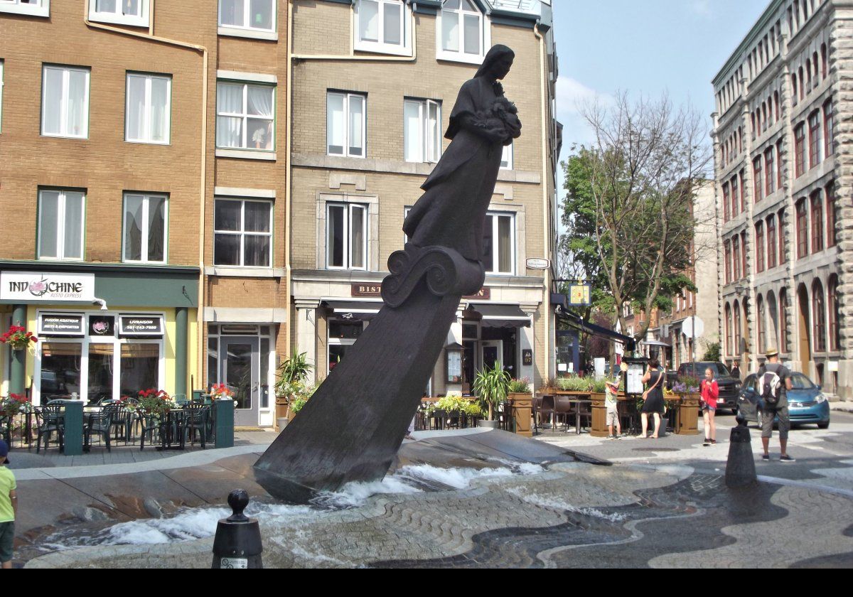 La Vivriere, a bronze statue by Richard Purdy, François Hébert, and Carmèle Arnoldin. Located at the intersection of Rue Saint-Pierre and Rue Saint-Paul, the piece commemorates the 50th anniversary of United Nations Food & Agriculture Organization, founded in 1945 in Quebec City.  The statue represents the bow of a ship.