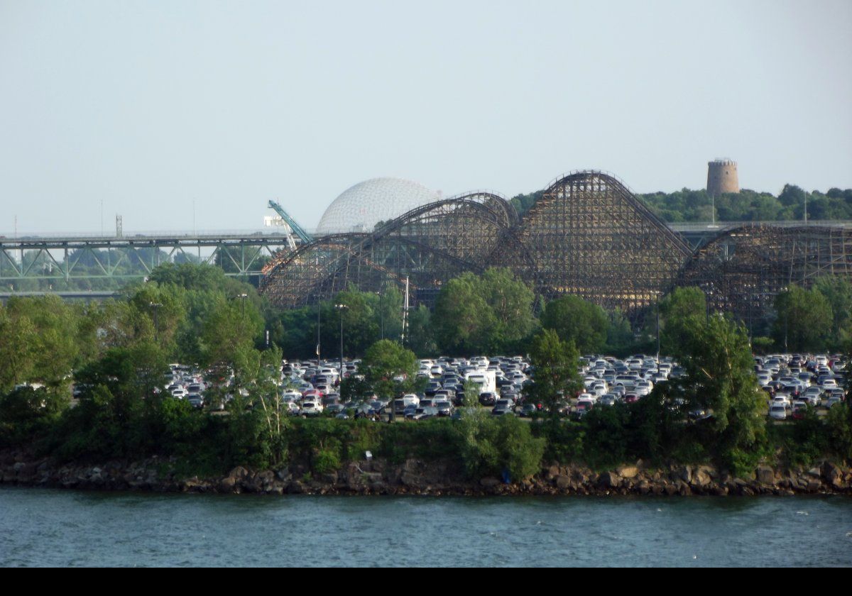 The La Ronde amusement park with the Montreal Biosphere and Tour de Lévis  in the distance.